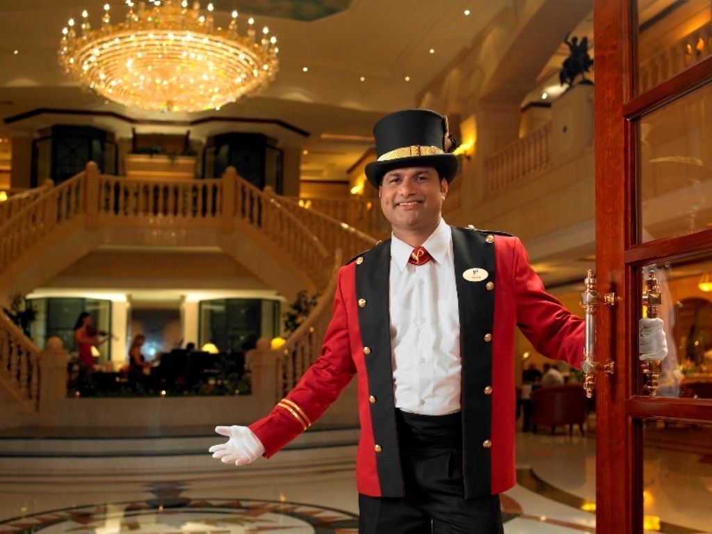 Knight Castle Hotel Дубай Экстерьер фото A doorman at the Grand Hyatt Hotel, Mumbai, India